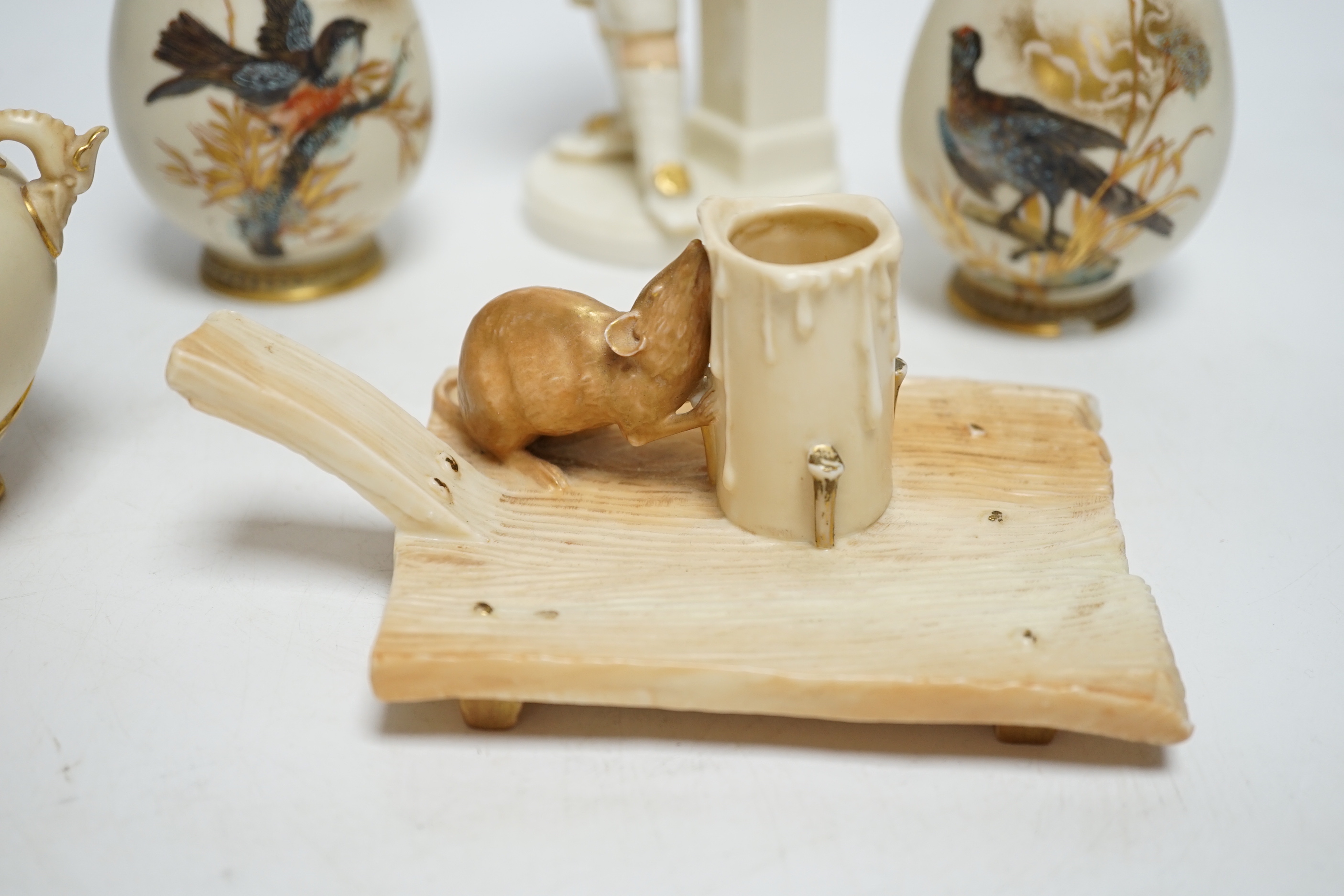 A group of five late 19th century Worcester ceramics, to include figure of a boy, a chamberstick formed as a mouse and candle, an Aesthetic period vase and a pair of bird painted vases